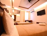 Ipil Suites Puerto Princesa в Пуэрто Принцесс Филиппины ✅. Забронировать номер онлайн по выгодной цене в Ipil Suites Puerto Princesa. Трансфер из аэропорта.