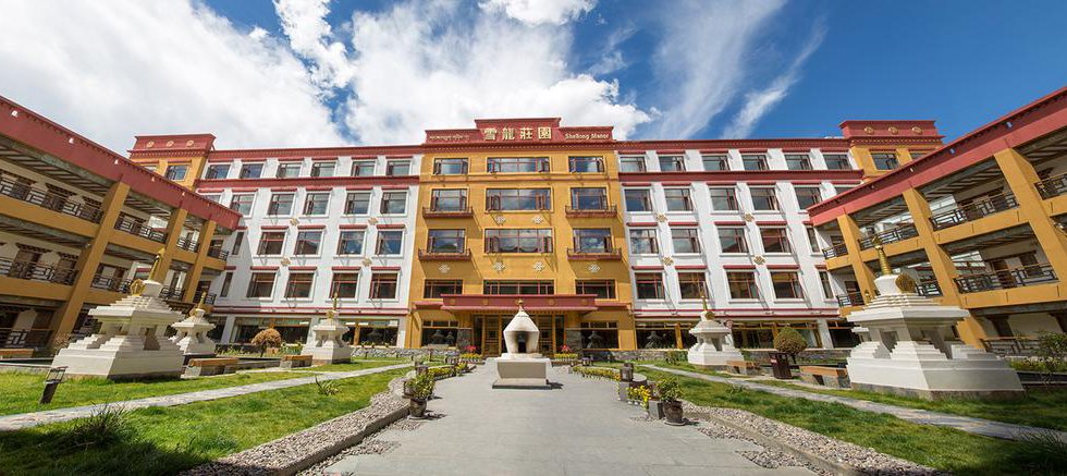Xuelong Zhuangyuan Hotel в Тибет Китай ✅. Забронировать номер онлайн по выгодной цене в Xuelong Zhuangyuan Hotel. Трансфер из аэропорта.