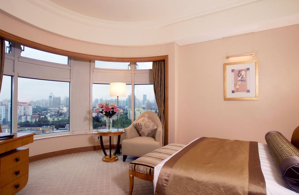 Radisson Blu Plaza Xing Guo Hotel Shanghai в Шанхай Китай ✅. Забронировать номер онлайн по выгодной цене в Radisson Blu Plaza Xing Guo Hotel Shanghai. Трансфер из аэропорта.