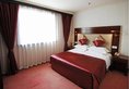 HuaJun Suite Hotel в Шанхай Китай ✅. Забронировать номер онлайн по выгодной цене в HuaJun Suite Hotel. Трансфер из аэропорта.