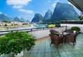 Green Lotus, River View Hotel в Яншо Китай ✅. Забронировать номер онлайн по выгодной цене в Green Lotus, River View Hotel. Трансфер из аэропорта.