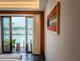 Sea Lily Yangshuo Riverside Honeymoon Hotel в Яншо Китай ✅. Забронировать номер онлайн по выгодной цене в Sea Lily Yangshuo Riverside Honeymoon Hotel. Трансфер из аэропорта.