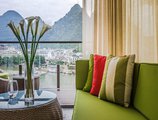 Sea Lily Yangshuo Riverside Honeymoon Hotel в Яншо Китай ✅. Забронировать номер онлайн по выгодной цене в Sea Lily Yangshuo Riverside Honeymoon Hotel. Трансфер из аэропорта.