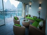 Sea Lily Yangshuo Riverside Honeymoon Hotel в Яншо Китай ✅. Забронировать номер онлайн по выгодной цене в Sea Lily Yangshuo Riverside Honeymoon Hotel. Трансфер из аэропорта.