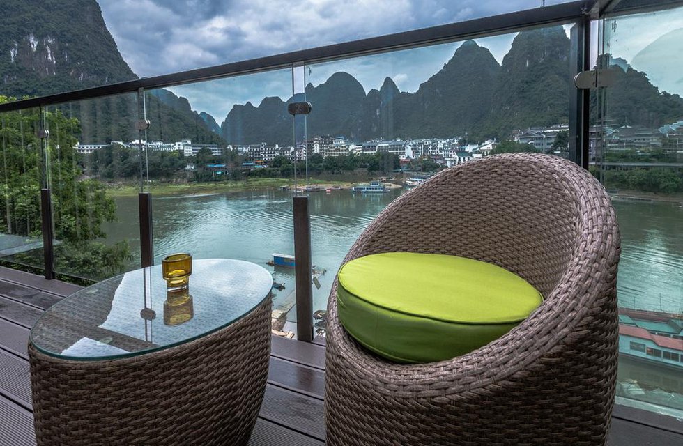 Sea Lily Yangshuo Riverside Honeymoon Hotel в Яншо Китай ✅. Забронировать номер онлайн по выгодной цене в Sea Lily Yangshuo Riverside Honeymoon Hotel. Трансфер из аэропорта.