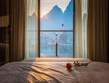 Sea Lily Yangshuo Riverside Honeymoon Hotel в Яншо Китай ✅. Забронировать номер онлайн по выгодной цене в Sea Lily Yangshuo Riverside Honeymoon Hotel. Трансфер из аэропорта.