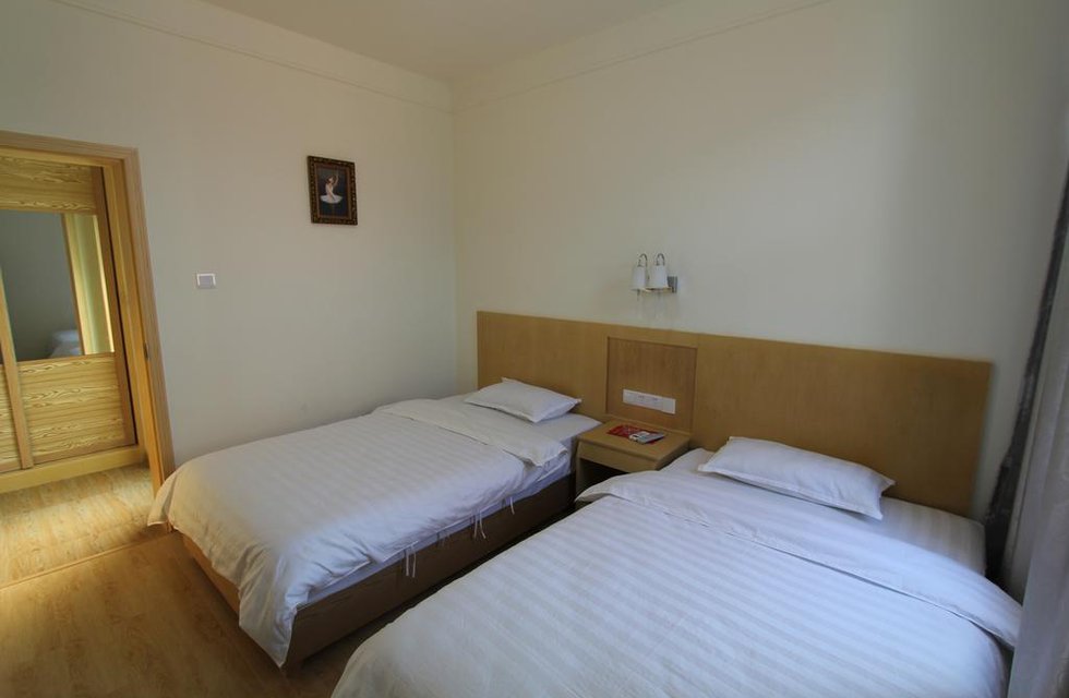 Yijia Apartment в Чжанцзяцзе Китай ✅. Забронировать номер онлайн по выгодной цене в Yijia Apartment. Трансфер из аэропорта.