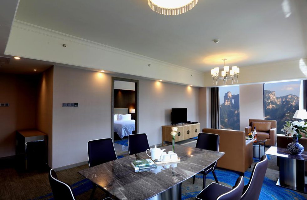Blue Bay Hotel в Чжанцзяцзе Китай ✅. Забронировать номер онлайн по выгодной цене в Blue Bay Hotel. Трансфер из аэропорта.