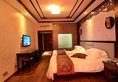 Gang Yuan Wellness Resort в Чжанцзяцзе Китай ✅. Забронировать номер онлайн по выгодной цене в Gang Yuan Wellness Resort. Трансфер из аэропорта.