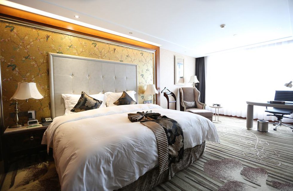 Sunshine Hotel Zhangjiajie в Чжанцзяцзе Китай ✅. Забронировать номер онлайн по выгодной цене в Sunshine Hotel Zhangjiajie. Трансфер из аэропорта.