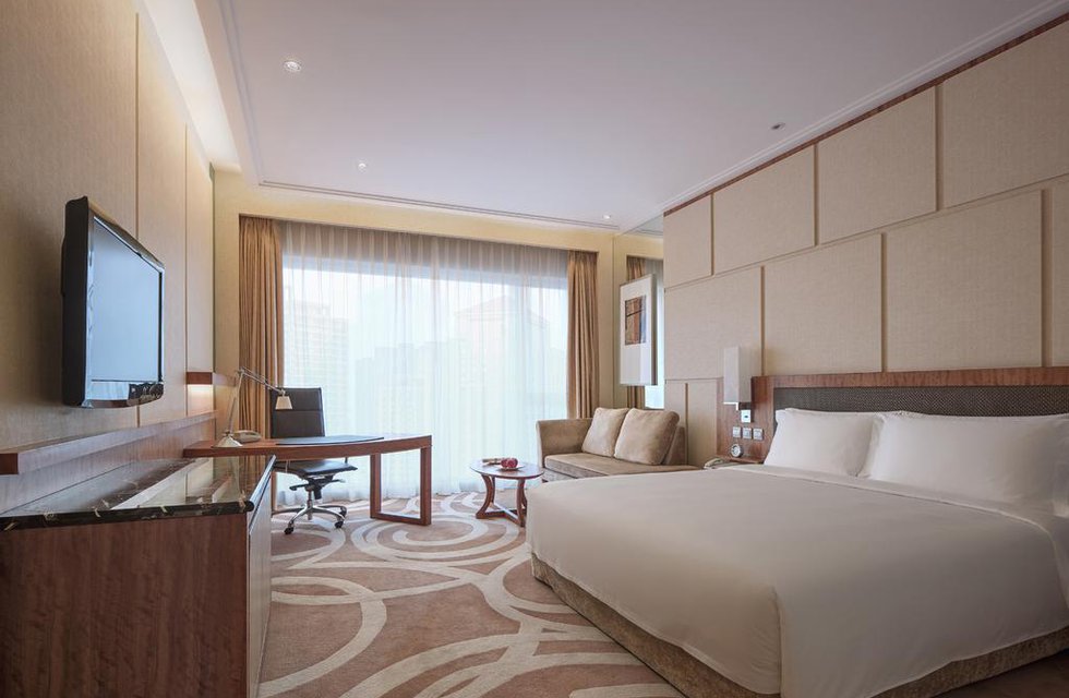 New World Dalian Hotel в Далянь Китай ✅. Забронировать номер онлайн по выгодной цене в New World Dalian Hotel. Трансфер из аэропорта.