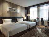 Ramada Plaza Xi'an South в Сиань Китай ✅. Забронировать номер онлайн по выгодной цене в Ramada Plaza Xi'an South. Трансфер из аэропорта.