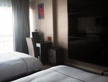 Lvgu Hotel в Иу Китай ✅. Забронировать номер онлайн по выгодной цене в Lvgu Hotel. Трансфер из аэропорта.