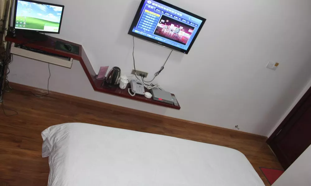 Zhangjiajie Yijiaqin Hotel, фото 3