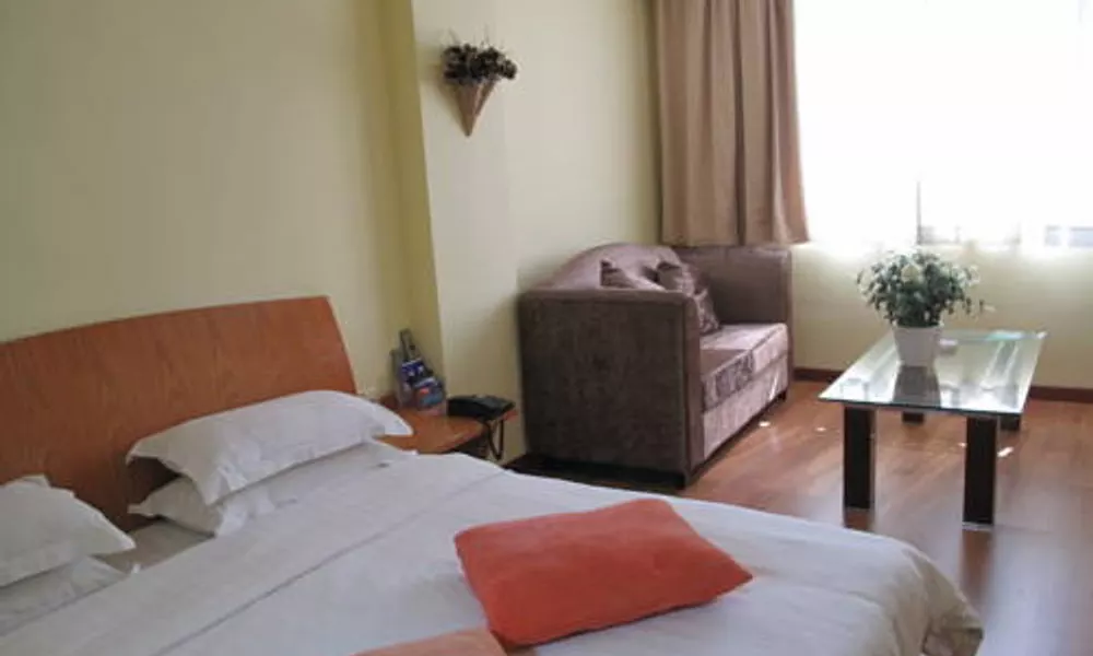 Home Club Hotel - Guang Yuan Xin Cun Branch, фото 2