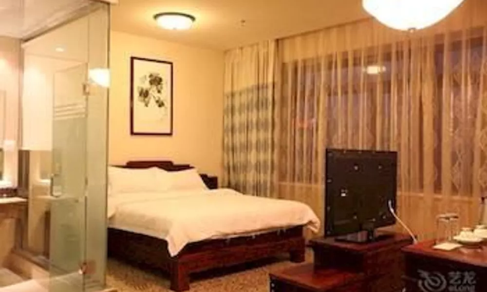 Qingdao Zhongyang Business Hotel, фото 2