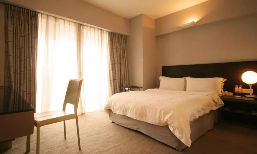 Yi-Wu Commatel Hotel, фото 2