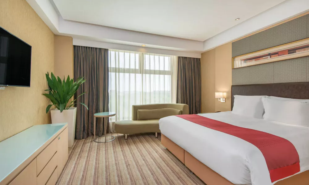 Qingdao  Parkview Holiday Hotel, фото 2