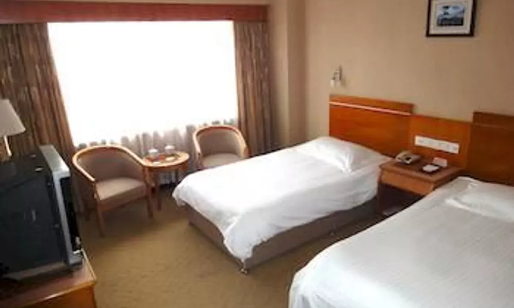 Zhi Yuan Lou Hotel - Qingdao, фото 2
