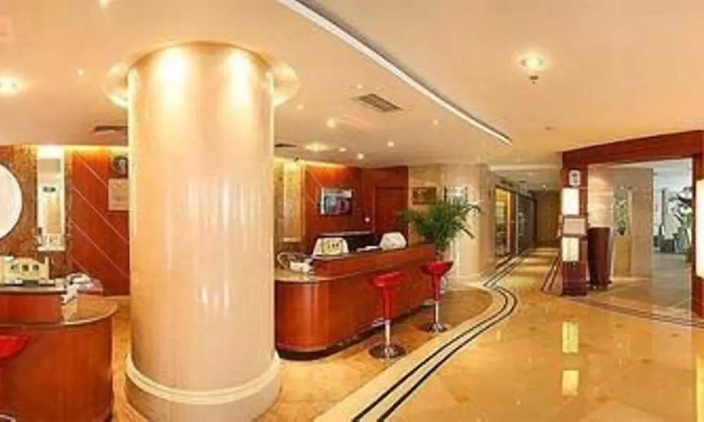 Chongqing South Garden Hotel, фото 2