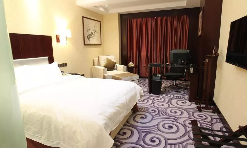 Zhangqiu Haitai Hotel, фото 2