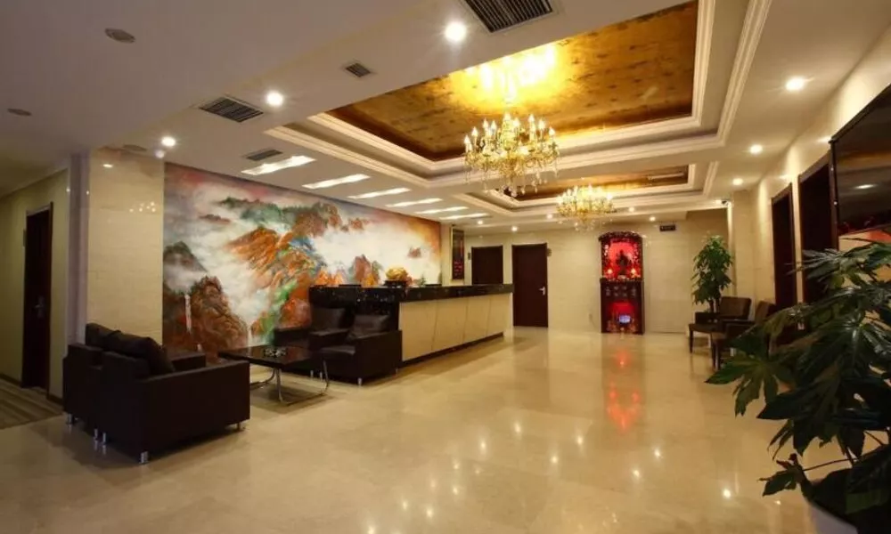 Qingdao Yixin Hotel, фото 4
