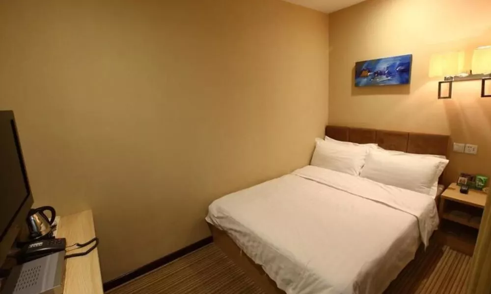 Qingdao Yixin Hotel, фото 2