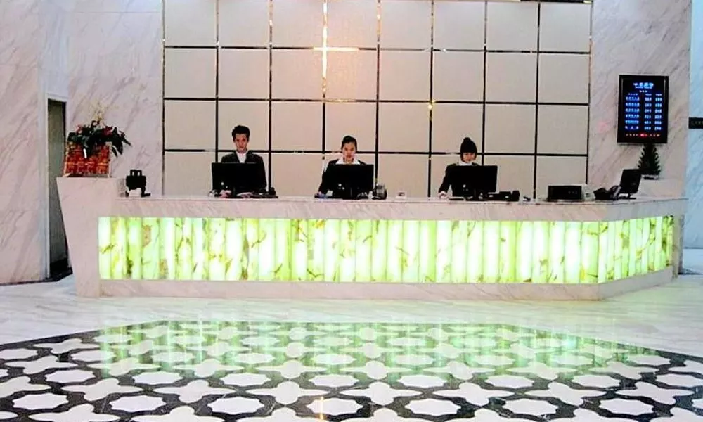 Dingzun Business Hotel, фото 2