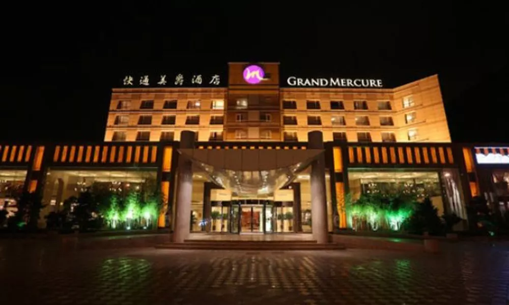 Qingdao KuaiTong International Hotel, фото 2
