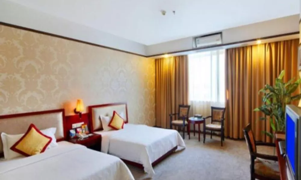 Guangzhou Shenglong Hotel, фото 2