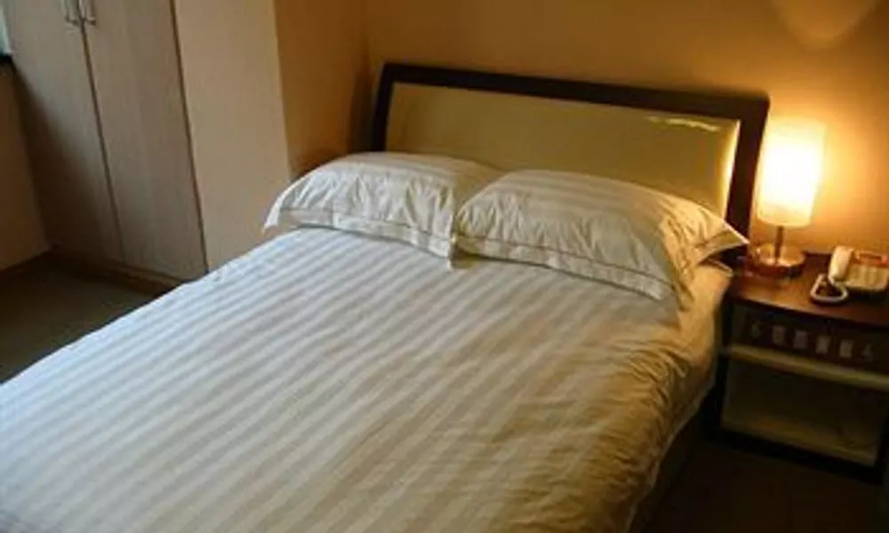 Jiujiu Holiday Hotel, фото 2